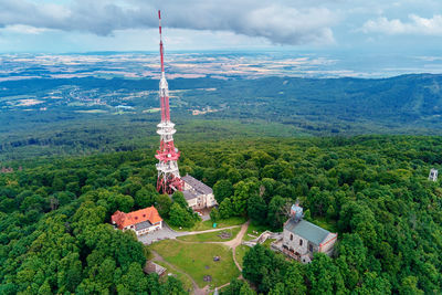 High angle view of building and trees against sky