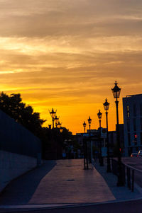 Silhouette of statue at sunset