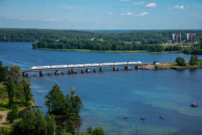 High angle view of high speed train on bridge over vuoksi river