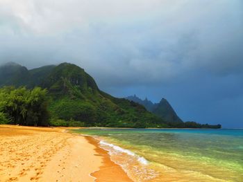 Scenic view of beach against sky