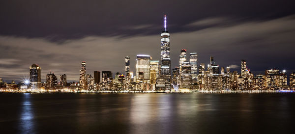 Downtown manhattan night skyline with world trade center detail panoramic