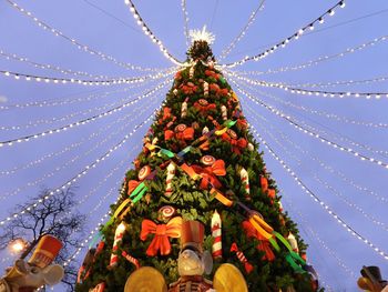 Low angle view of christmas tree against sky