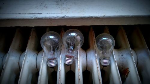 High angle view of light bulbs on radiator