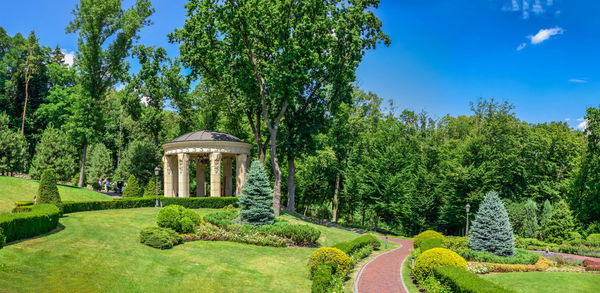 Alcove near the honka house in the mezhyhirya residence, kyiv, ukraine, on a sunny summer day