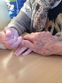 High angle view of people on table