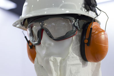 Close-up of protective workwear on mannequin in workshop