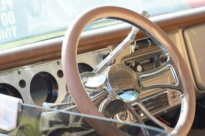 Close-up of steering wheel in car