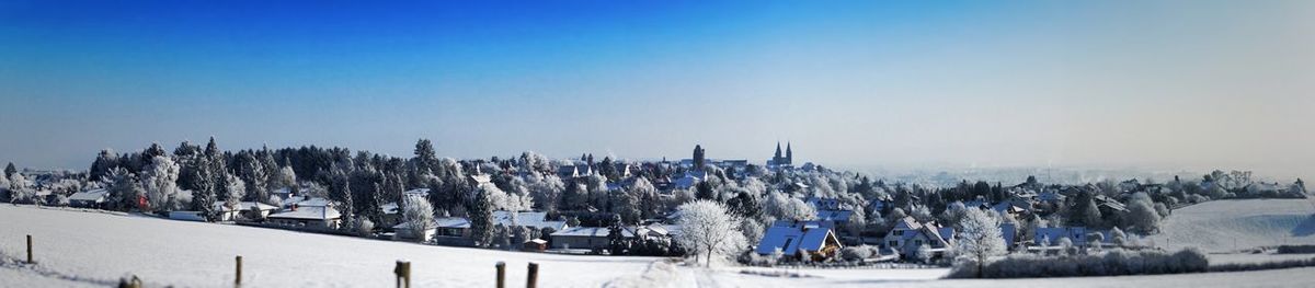 Panoramic view of people in winter