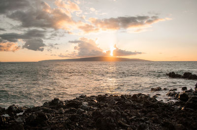Scenic view of sea against sky during sunset