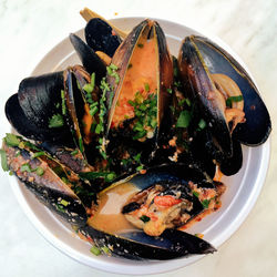 Close-up of mussels served in plate