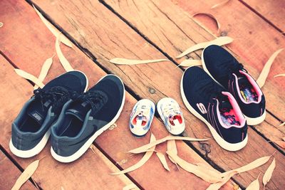 High angle view of shoes on tiled floor