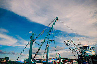 Boats moored at harbor