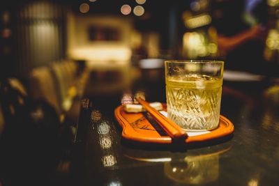 Close-up of wineglass on table