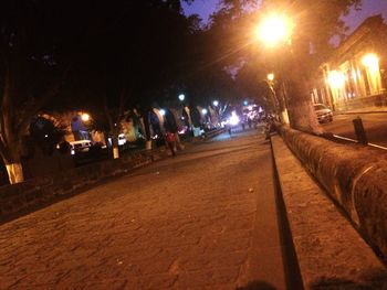 Street light on road at night