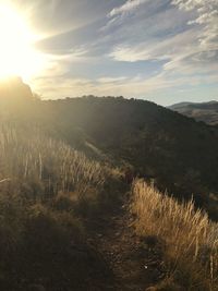 Scenic view of landscape against sky during sunset