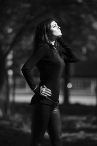 Young woman looking away outdoors