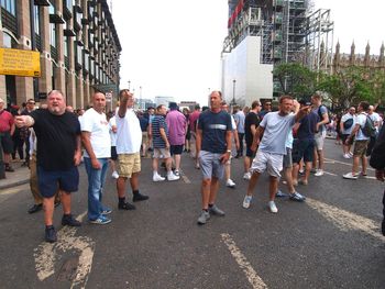 People walking on street in city