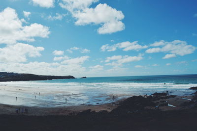 Scenic view of sea against cloudy sky