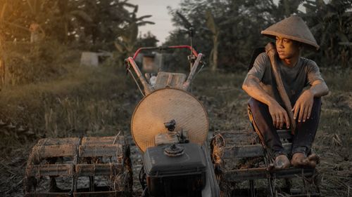 Full length of man sitting in bus