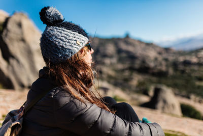 Rear view of woman looking at mountain