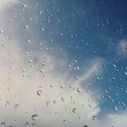 Close-up of water drops on glass