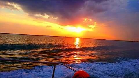 Scenic view of sea at sunset