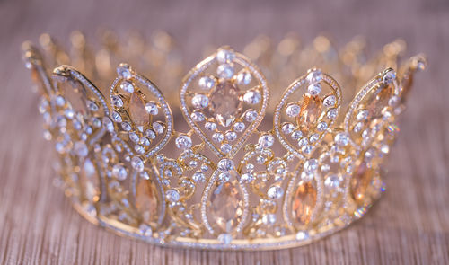 Close-up of crown on table