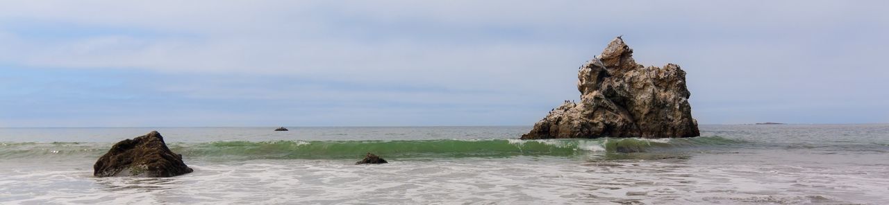 sea, horizon over water, water, sky, beach, scenics, tranquil scene, tranquility, rock - object, shore, beauty in nature, rock formation, cloud - sky, nature, cloud, idyllic, cloudy, rock, wave, cliff