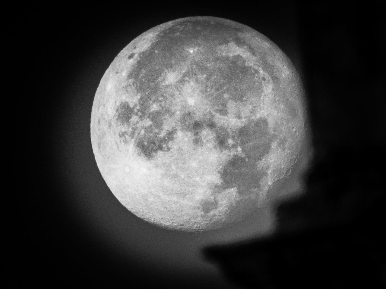 CLOSE-UP OF MOON AGAINST SKY