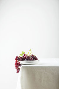 Close-up of christmas decorations against white background