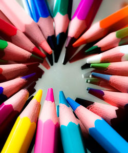 High angle view of colored pencils on table