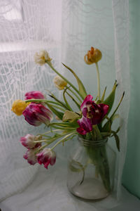 Close-up of flower vase on table