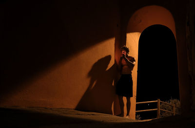 Shadow of people on wall