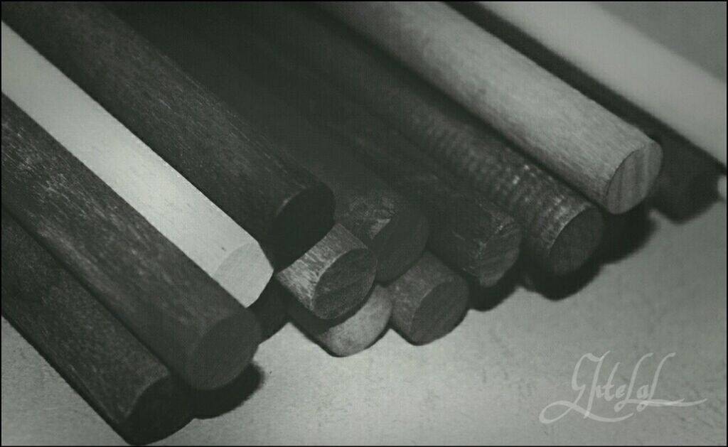 close-up, high angle view, indoors, still life, wood - material, no people, wall - building feature, metal, auto post production filter, pattern, art and craft, day, shadow, safety, protection, wooden, part of, table, textured