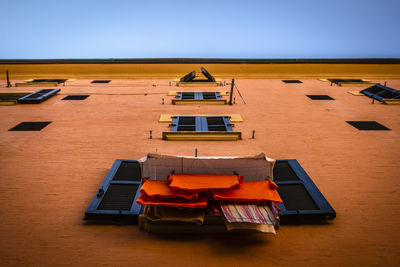 High angle view of building against clear sky