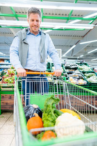 Man having food in store