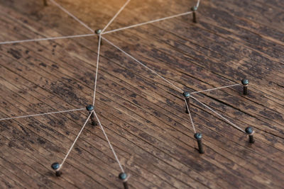 High angle view of barbed wire on table