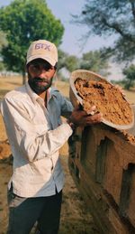 A man doing mud work.