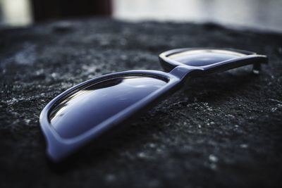 Close-up of eyeglasses on table