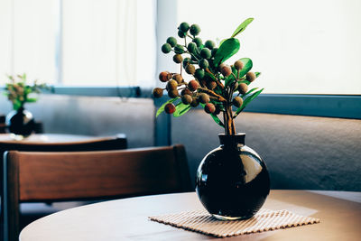 Close-up of plant on table in restaurant