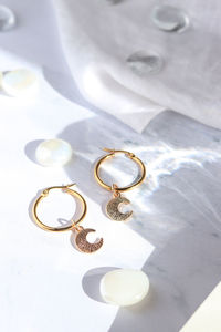 High angle view of wedding rings on table