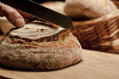 Close-up of hand holding bread