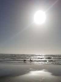 Scenic view of beach against clear sky