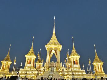 Illuminated cathedral against clear sky