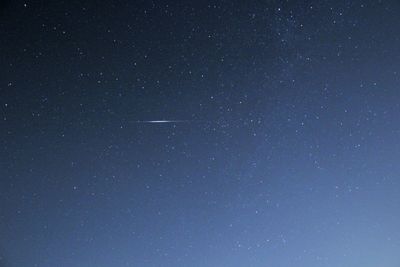 Low angle view of stars against sky at night