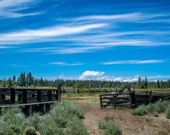 Scenic view of landscape against cloudy sky
