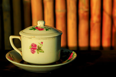 Close-up of tea cup on table