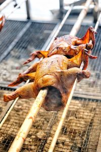 Close-up of meat on barbecue grill