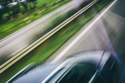 Defocused image of car on road