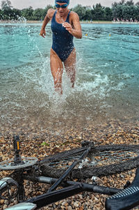 Woman running in sea